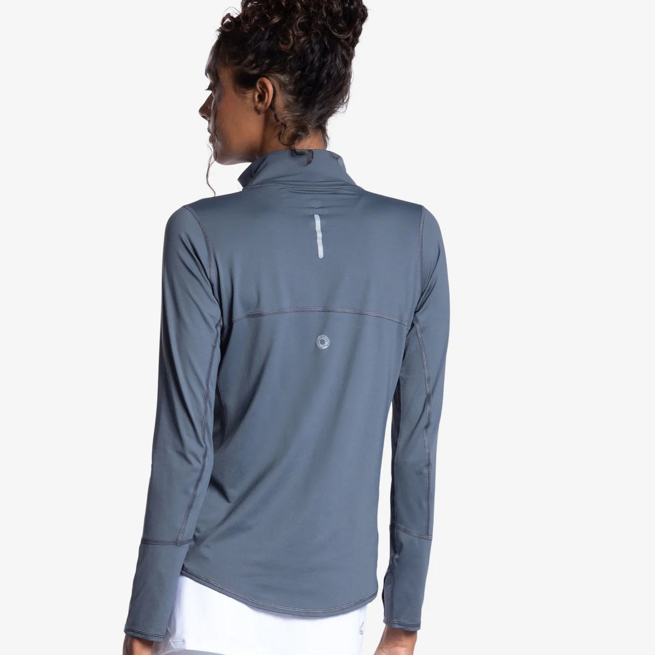 Woman wearing a grey long-sleeve top with a quarter zip, SPF 50 - Back