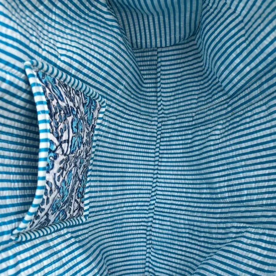 Inside of cotton quilted bag.