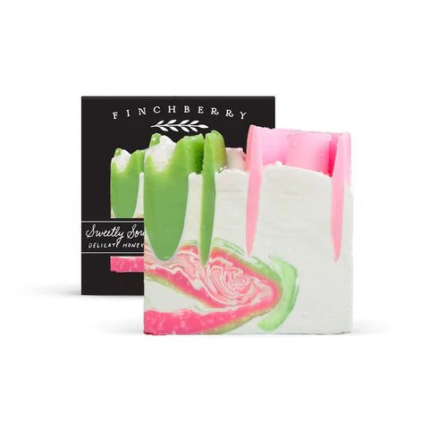 Colorful soap bars with a 'Finchberry' branded box on a white background