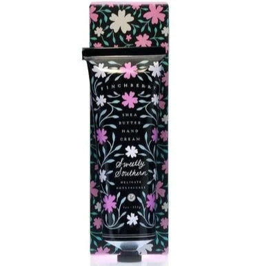 A tube of Finchberry Sweetly Southern hand cream with a floral pattern design.