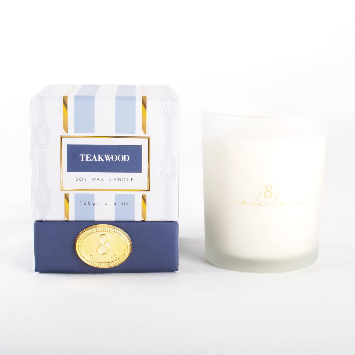 5.6 oz luxurious soy wax candle beautifully packaged with a nautical theme, the aroma is Teakwood