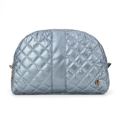 A Quitted nylon cosmetic bag in a frosted sky color with a zipper top, made by Lemonbella
