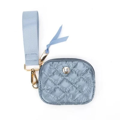 A blue quilted leather keychain wallet with a wrist strap, metal hardware, and a decorative ribbon, made by Lemonbella