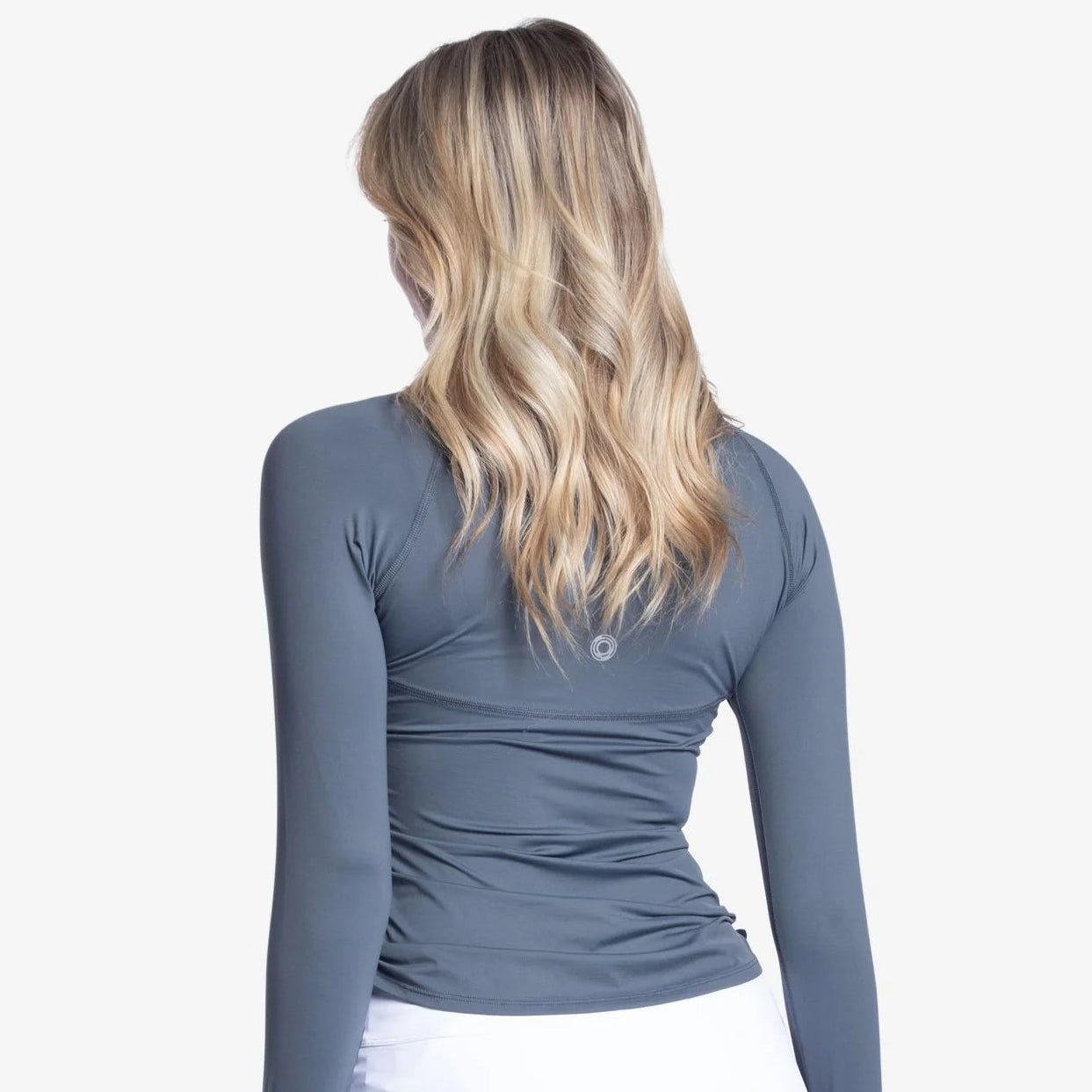 Back side of woman wearing a drawstring crew long sleeve 50-UPF Shirt.