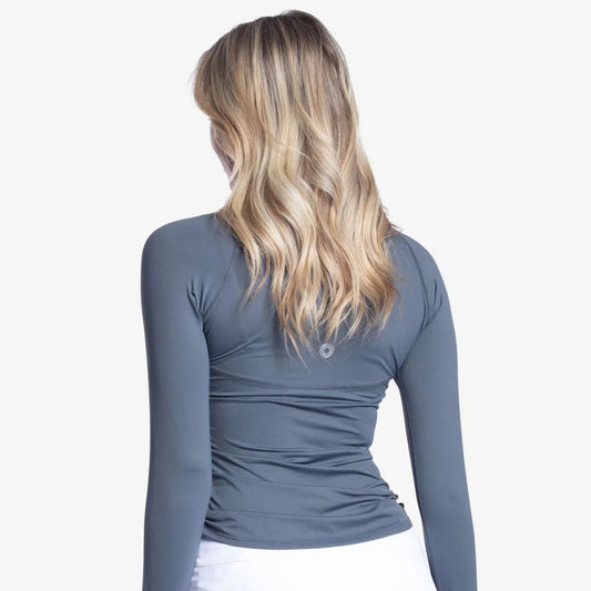 Back side of woman wearing a drawstring crew long sleeve 50-UPF Shirt.