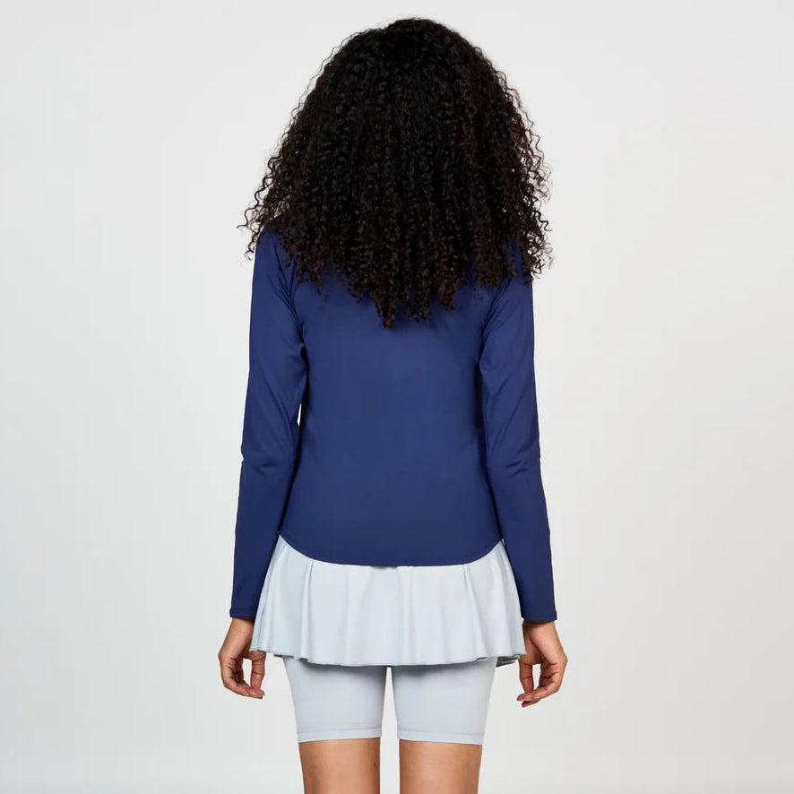 Back of women's long sleeve sport top in Navy, made of Sofi Premier Fabric, UPF 50+, mesh undersleeve inserts for ventilation.
