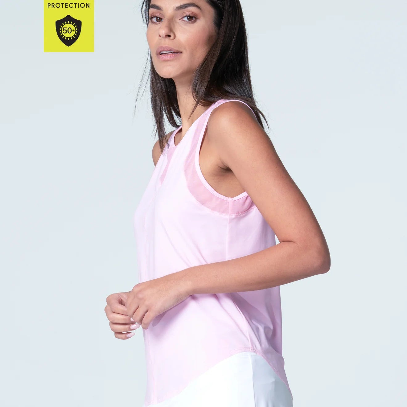 Side view of round neck, full back, pink sand tank is made from UPF 50+ super lightweight polyester