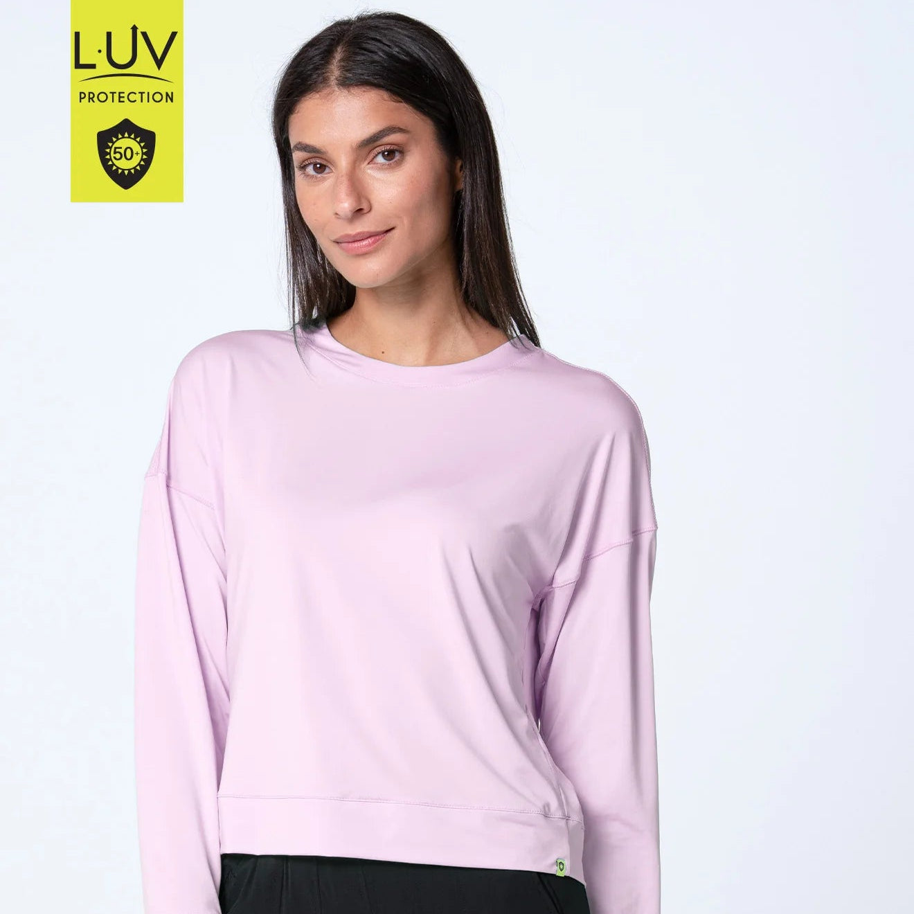 Front view of round neck, drop shoulder, pink sand long sleeve UPF 50+ for extra fun in the sun.