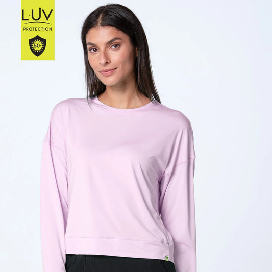 Front view of round neck, drop shoulder, pink sand long sleeve UPF 50+ for extra fun in the sun.