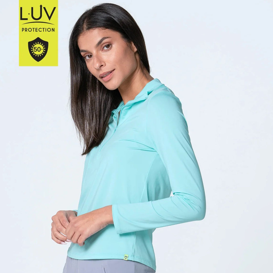 Side view of lightweight SPF 50 sun protection top that keeps you cool and protected from the sun. This zip mock neck top is done in our signature  and features mesh inserts along the sleeves for added breathability and fashion flair.