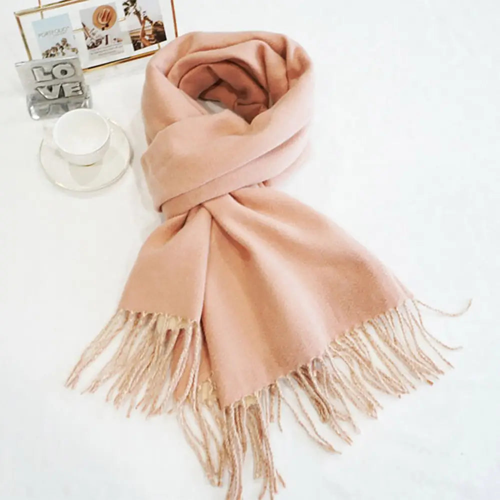 Light Pink/off-white classic soft scarf featuring elegant fringe edges.