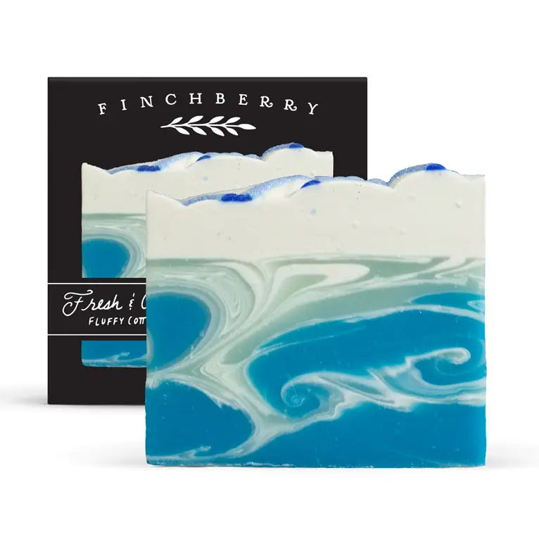Marbled blue and white soap with a black 'Finchberry' branded card in the background.