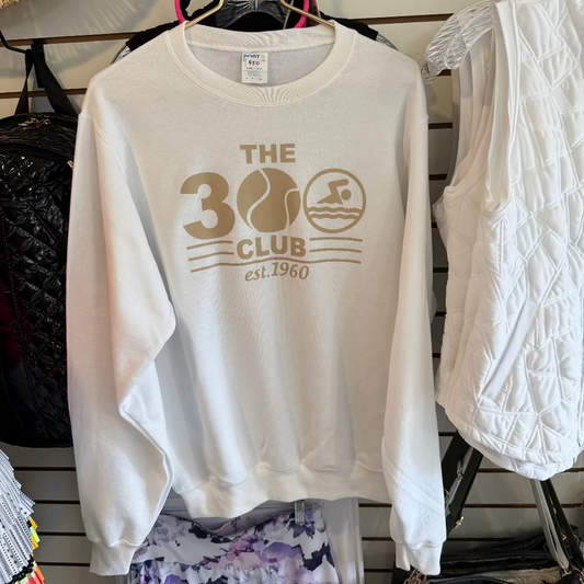 White sweatshirt with 'The 30 Club' logo printed in khaki color on the front