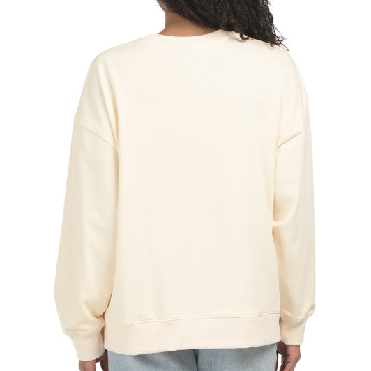 Back of woman wearing a cream sweatshirt with 'American Pickleball Club' logo on the front