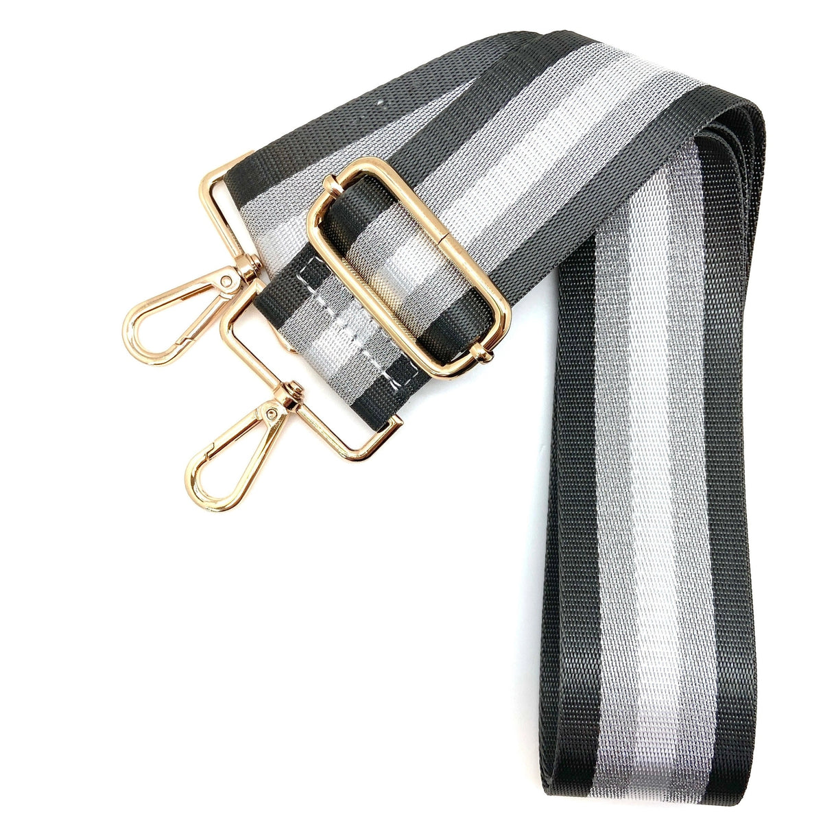 Striped shoulder strap with dark gray, silver and white stripes, featuring a gold-tone metal buckle and two swivel snap hooks