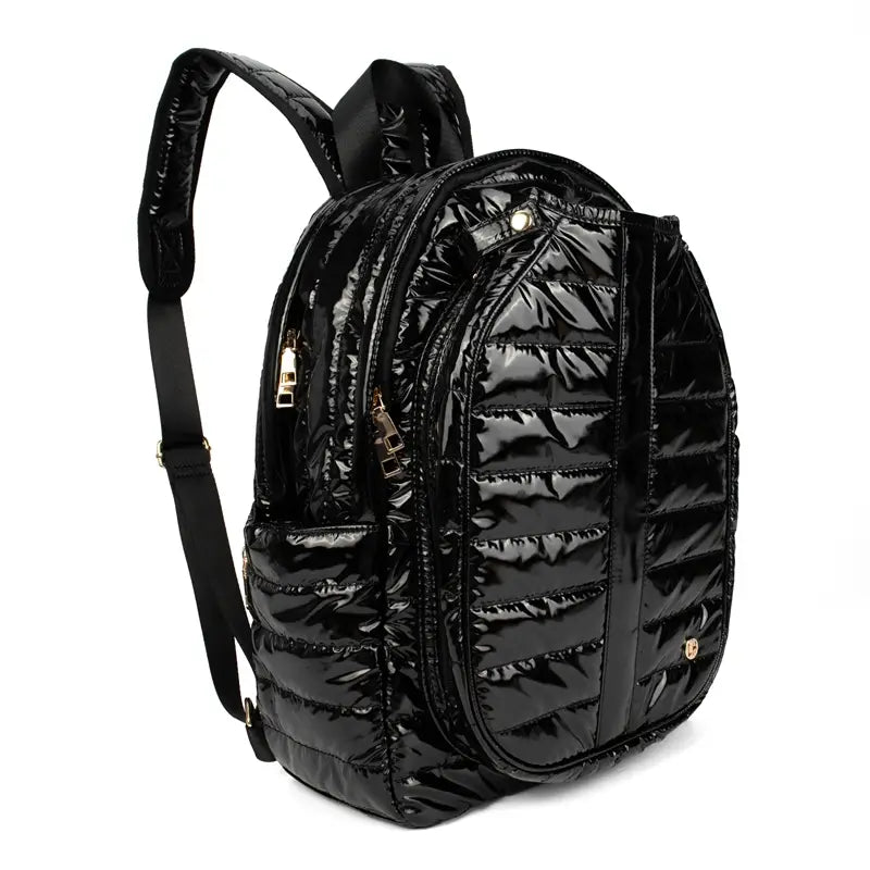 Quilted nylon backpack with specialized pickleball paddle storage and a sporty aesthetic in shiny quilted slate black