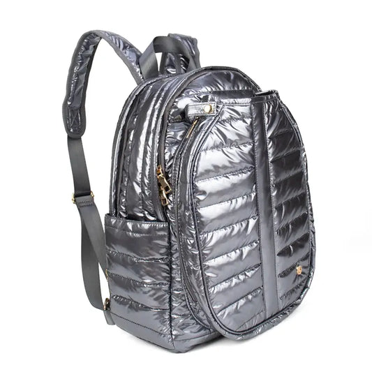Side view of quilted nylon backpack with specialized paddle storage and a sporty aesthetic in shiny quilted steel gray silver