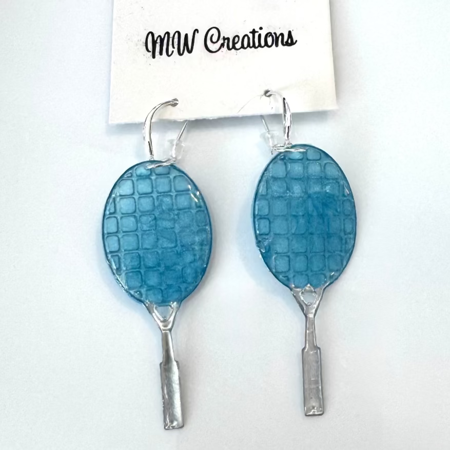 Back side of Blue and silver tennis racket-shaped earrings on a white card with 'MW Creations' branding.