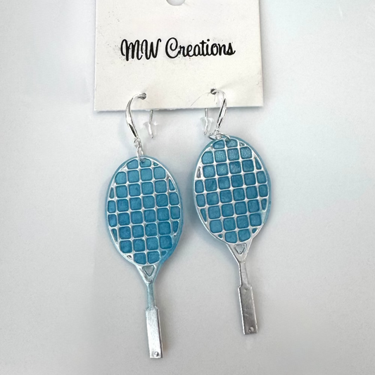 Blue and silver tennis racket-shaped earrings on a white card with 'MW Creations' branding.